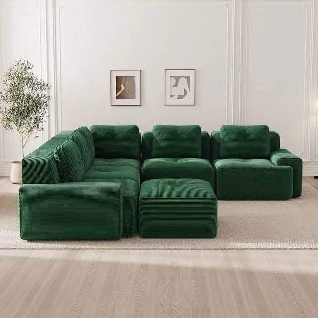 Divano letto Minimal con poggiapiedi coordinato in velluto verde cordato per il tuo soggiorno