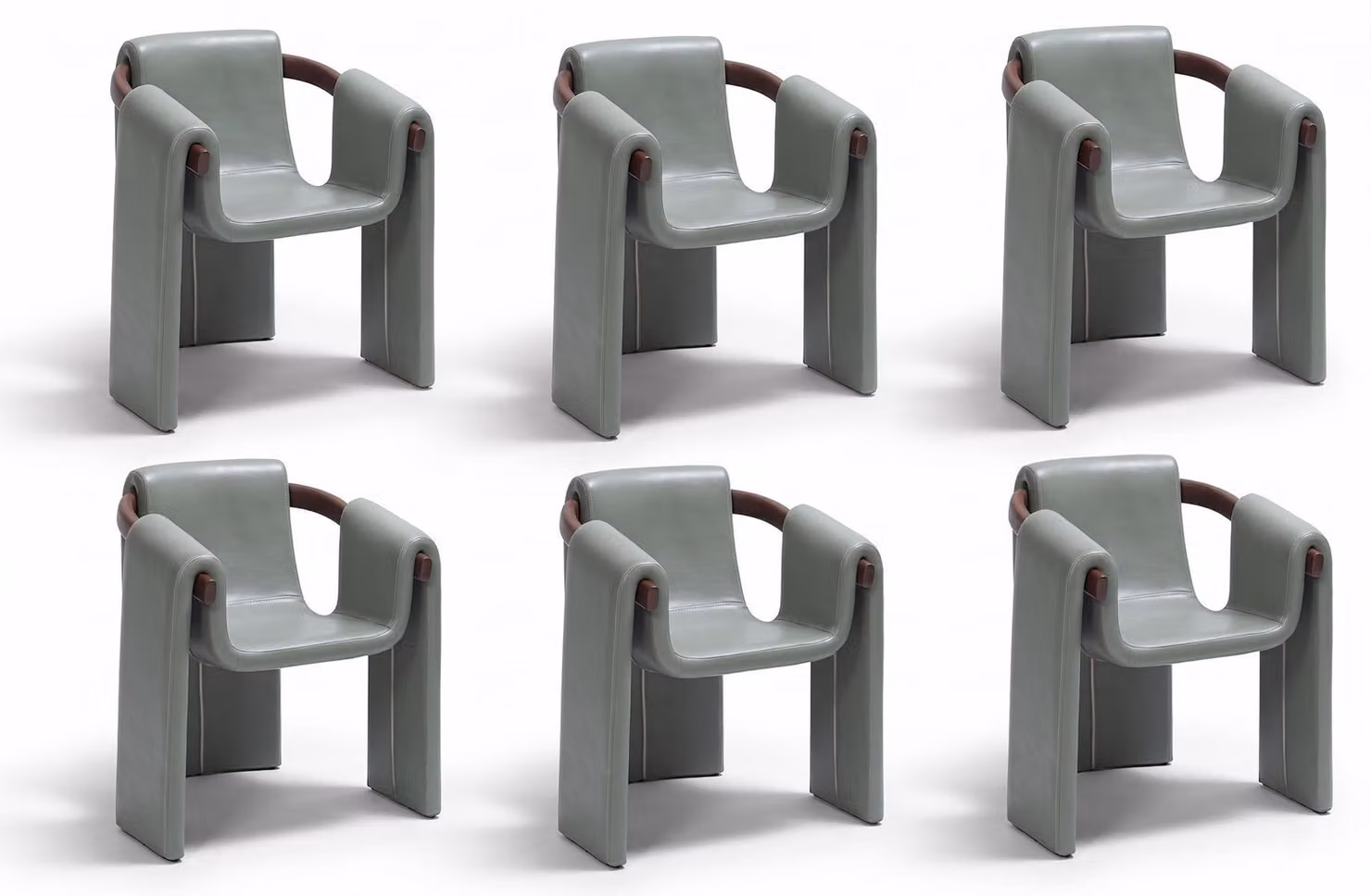 Gruppo di sedie grigio, rivestite in ecopelle, con struttura in legno, dal design moderno, caratterizzate da un'eleganza senza tempo