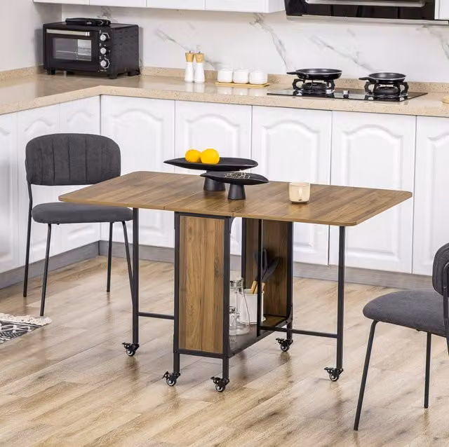Tavolo da pranzo pieghevole 130x80x74 cm marrone chiaro, 6 posti, ruote, vano