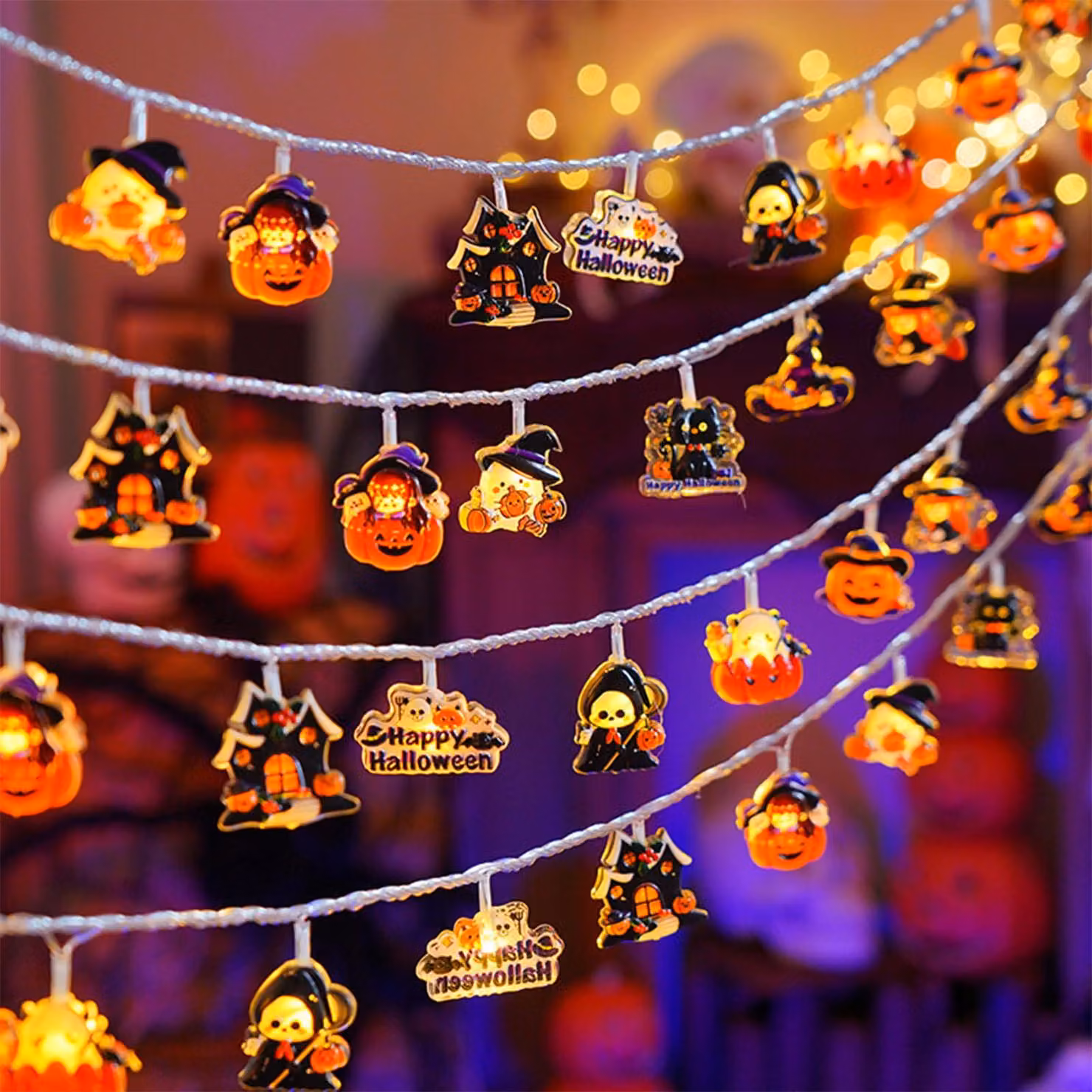 Catena luminosa a tema Halloween, lunghezza 1,5 metri, 10 LED, alimentata a batteria, con decorazioni a forma di zucca e fantasma