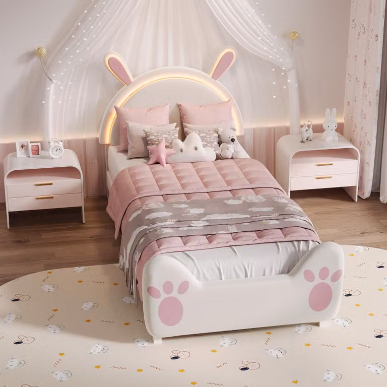 Letto imbottito per bambini UnboxG 90x200 cm con motivo a coniglietto e illuminazione d'atmosfera a LED, morbido tessuto in velluto e motivo a zampe, struttura sicura per la cameretta delle bambine