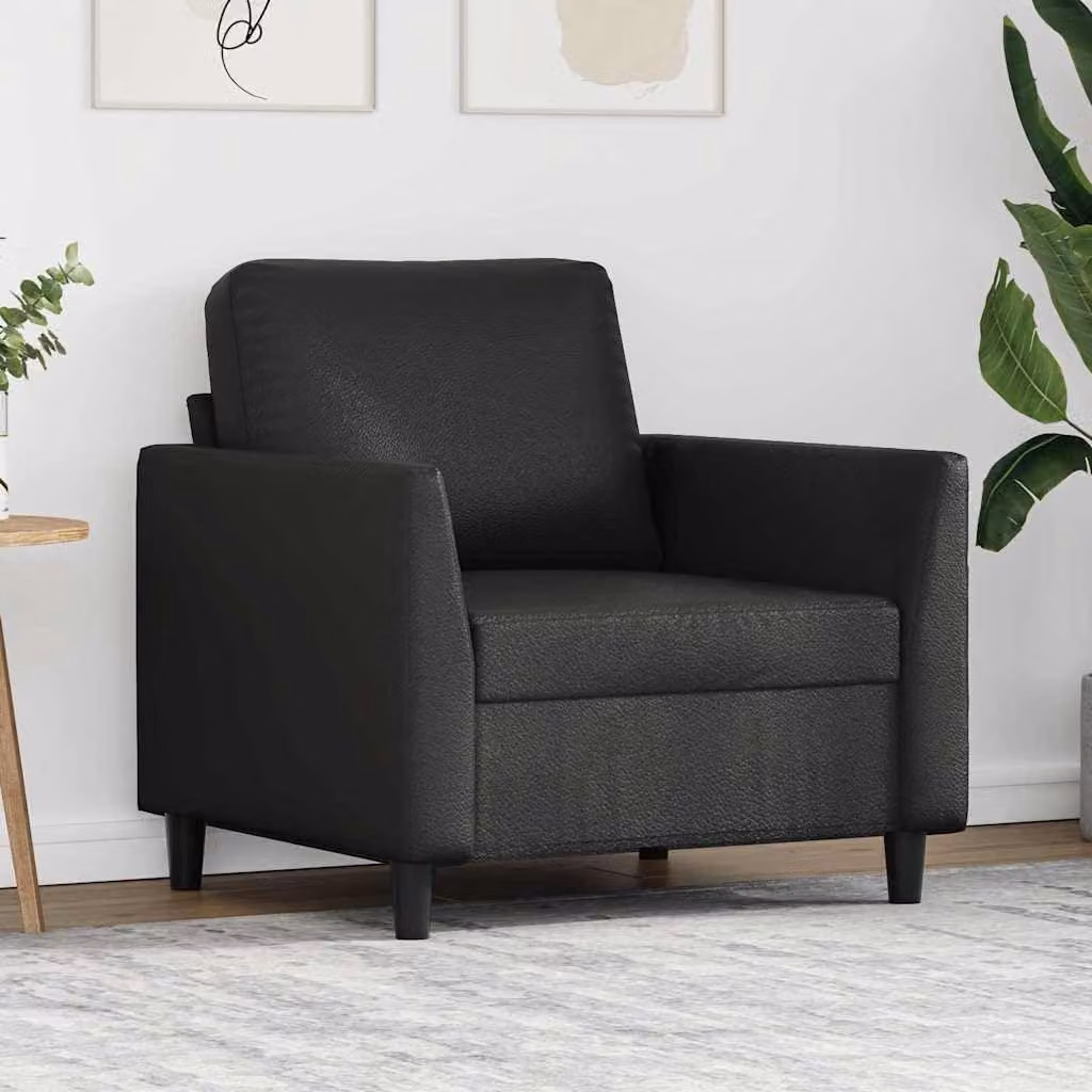 Poltrona nera, altezza 60 cm, realizzata in ecopelle con una struttura in metallo resistente e un'imbottitura spessa per garantire un'esperienza di seduta confortevole