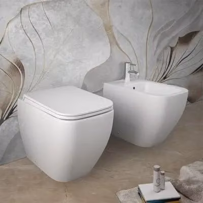 Sanitari filomuro Rak serie Metropolitan in ceramica bianco opaco con tecnologia Rimless e copriwcata soft-close L: 52,5 cm, P: 40,0 cm, H: 33,7 cm