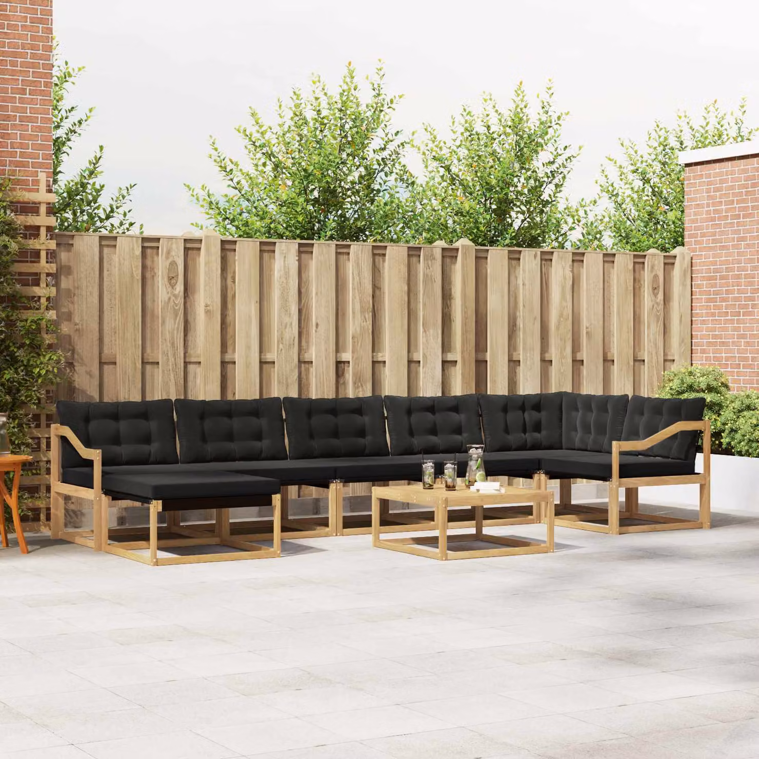 Set di divani da esterno vidaXL 8 pz in legno di acacia con cuscini bianchi e neri e tavolino da giardino a forma di L