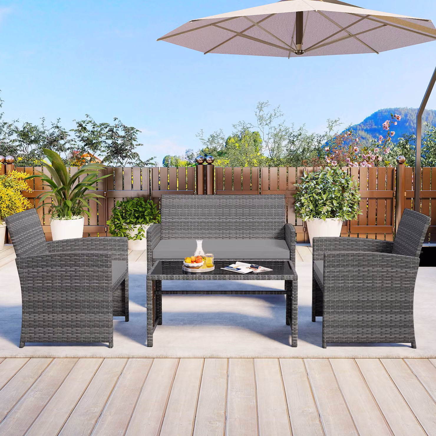 Set conversazione da esterno Costway 4 pezzi in polyrattan con cuscini e tavolo in vetro temperato Grigio