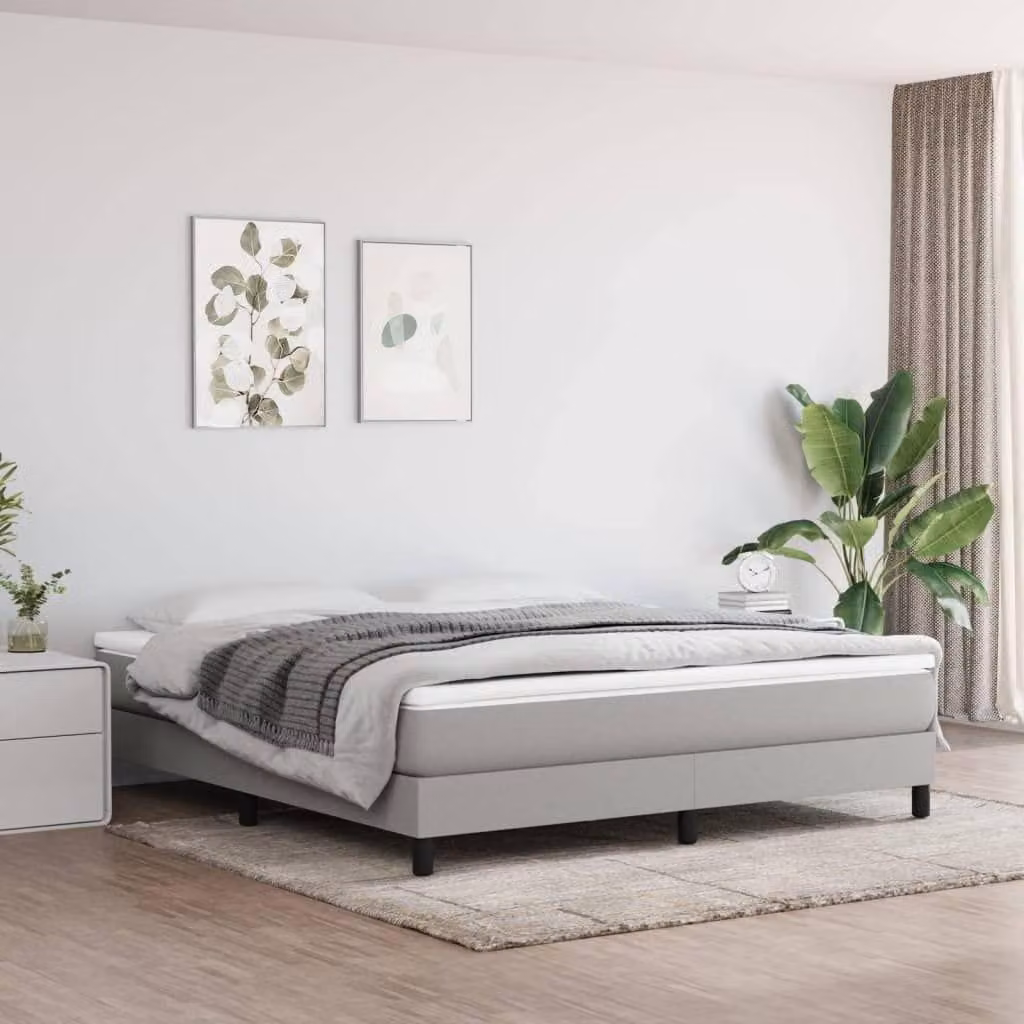 Letto con rete a molle, rivestito in tessuto color grigio chiaro, dimensioni 180x200 cm, con struttura robusta
