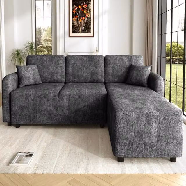Divano angolare a L con penisola Vovees Living, modello moderno a 3 posti in tessuto nero e grigio con 2 cuscini inclusi, L/P/H: 187.5 x 144 x 85.5 cm