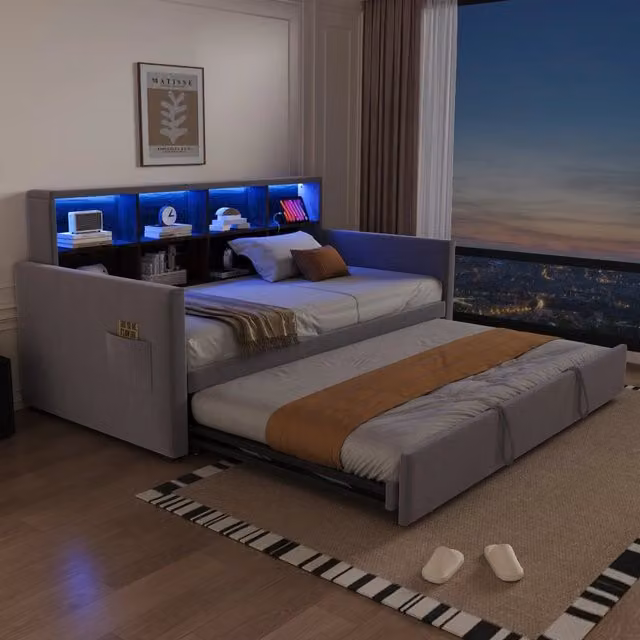 Letto imbottito REDOM in velluto grigio con testiera contenitore, mensola laterale, porta USB e illuminazione sottostante, L/P: 90 x 190 cm – 1