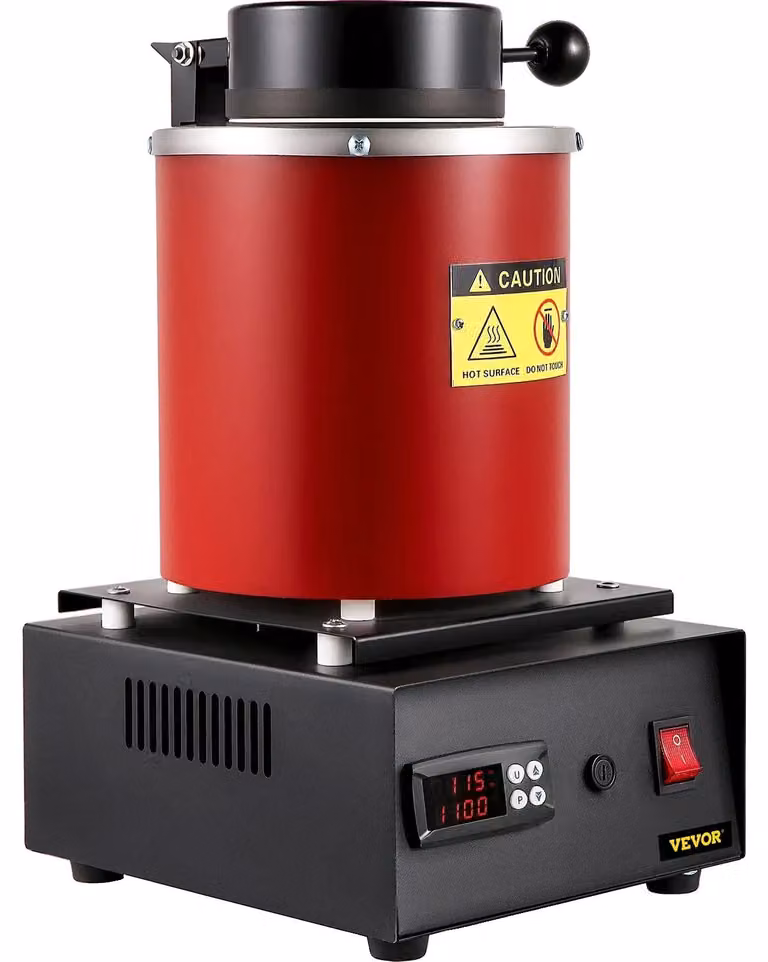 Fornace di fusione, temperatura massima di esercizio 1150 °C, potenza assorbita 1750 W, capacità del crogiolo 3,0 kg, dimensioni interne 5,0 cm x 16,0 cm, dimensioni del prodotto 38,0 cm x 24,0 cm x 21,0 cm