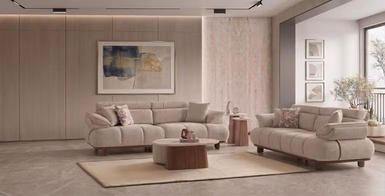 Set composto da: divano a 3 posti, tavolino, poggiapiedi, set di tavolini. Design moderno, colore beige, elegante