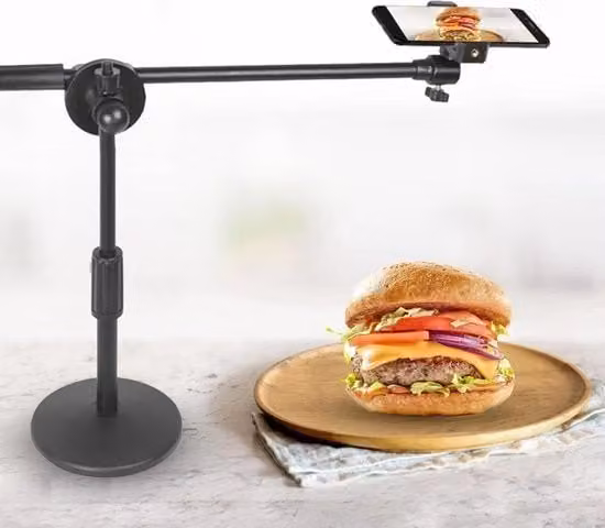 Stativo per smartphone e fotocamera da tavolo nero, regolabile in altezza e angolo con base stabile a rullo