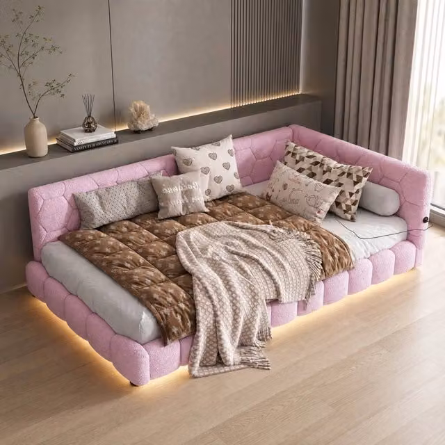 Divano letto Mivray rosa con rete a doghe rigide, illuminazione LED sottostante e porte di ricarica USB e Type-C, L/P: 90 x 200 cm