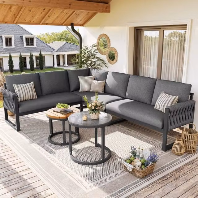 Set lounge da giardino modulare MIVRAY con divano angolare a sinistra, tavolini e cuscini in olefina grigi sfoderabili