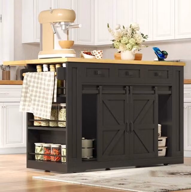 Isola cucina mobile nera e naturale con piano ribaltabile, prese USB e cassetti