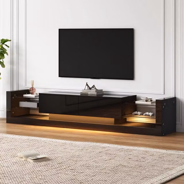 Mobile porta TV moderno Vovees Living nero lucido con illuminazione LED integrata, L: 181 cm, P: 38 cm, H: 38 cm