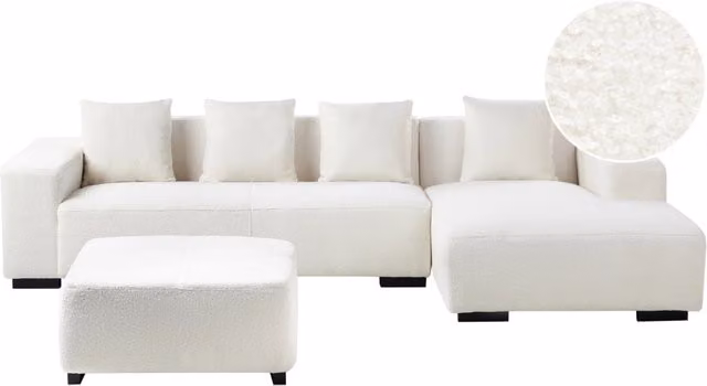 Divano angolare a L Beliani in tessuto bouclé bianco con ottomana e cuscini, versione a sinistra, stile moderno per il tuo soggiorno