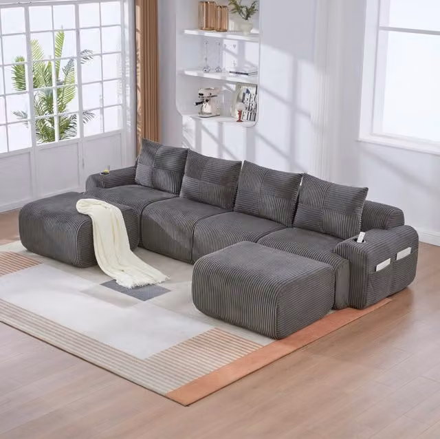 Divano modulare 4 posti 333x174x80 cm in tessuto grigio scuro, con 2 pouf e tasca laterale –