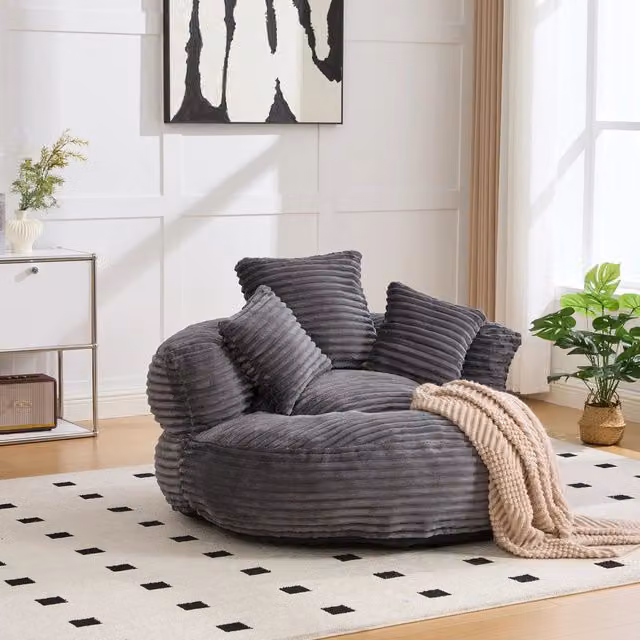 Poltrona sacco in velluto a coste grigio scuro con schienale alto; 108x108x52 cm