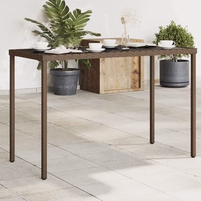 Maison Exclusive - Tavolo da giardino con piano in vetro marrone 115x54x74 cm Poly Rattan