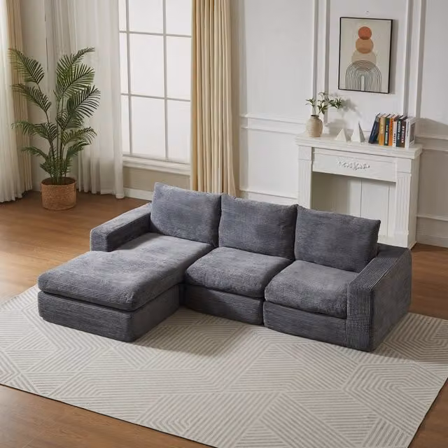 Divano angolare MIVRAY in velluto a coste grigio scuro con chaise longue reversibile e quattro moduli per il tuo soggiorno