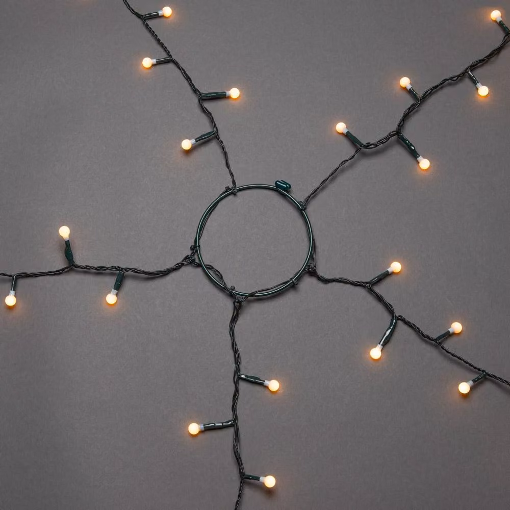 Konstsmide LED albero mantello con anello Ø 11, con globi, 5 fili di 30 diodi ciascuno, preassemblati, 150 diodi color ambra, trasformatore 30V_interno, cavo verde - 6367-820