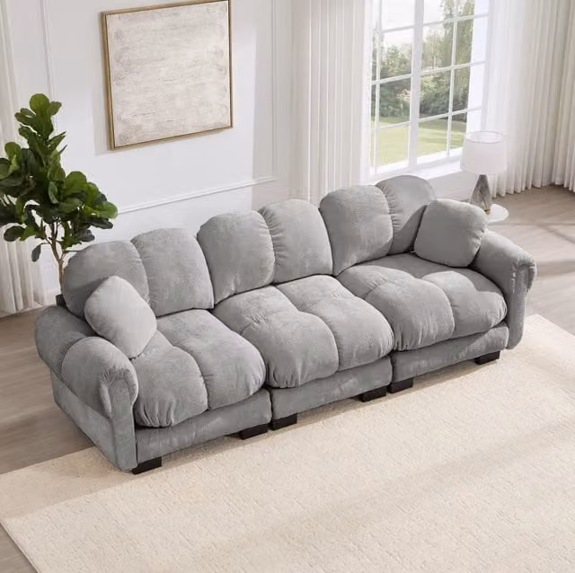 Divano modulare in chenille 260x86x90 cm con cuciture trapuntate; cuscini spessi; grigio chiaro