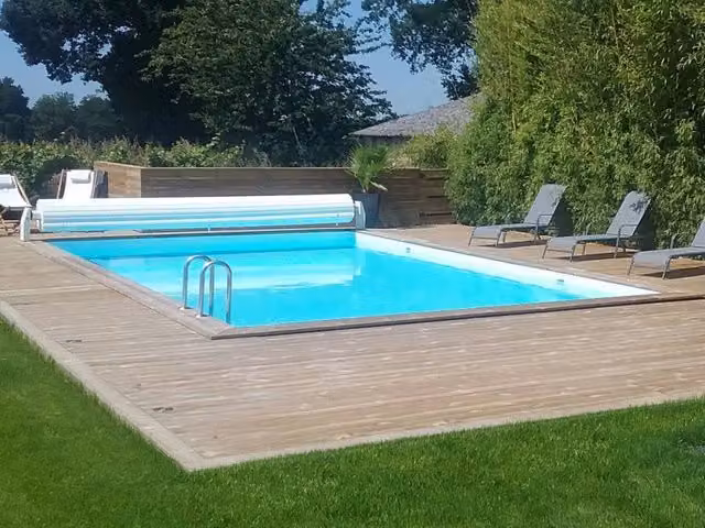 Piscina rettangolare fuori terra in legno Oceano Habitat et Jardin, colore blu, L: 920 cm, P: 520 cm, H: 144 cm