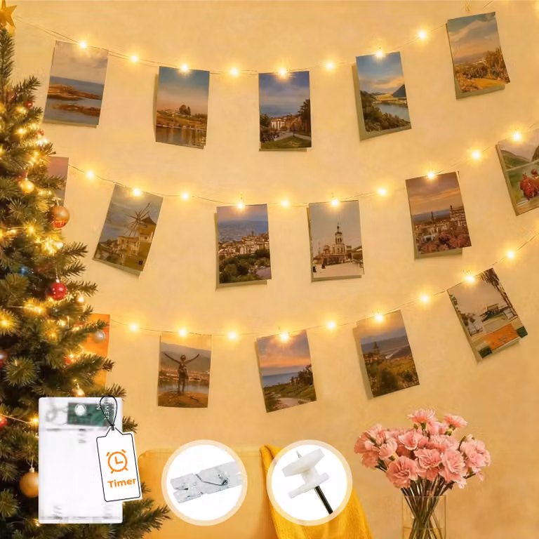 Catena luminosa con 50 LED bianco caldo, alimentata a batteria e dotata di 30 clip