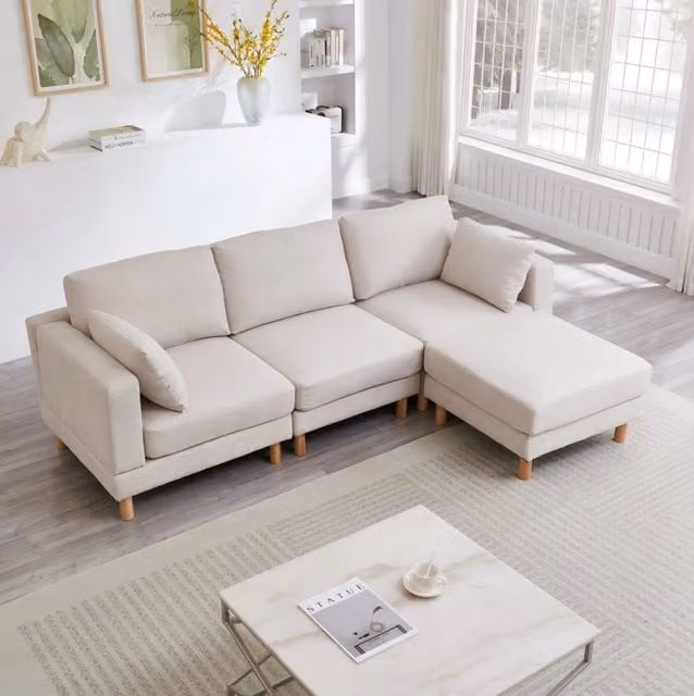 Divano angolare 3 posti con pouf 235x152 cm in poliestere beige HOMVRA
