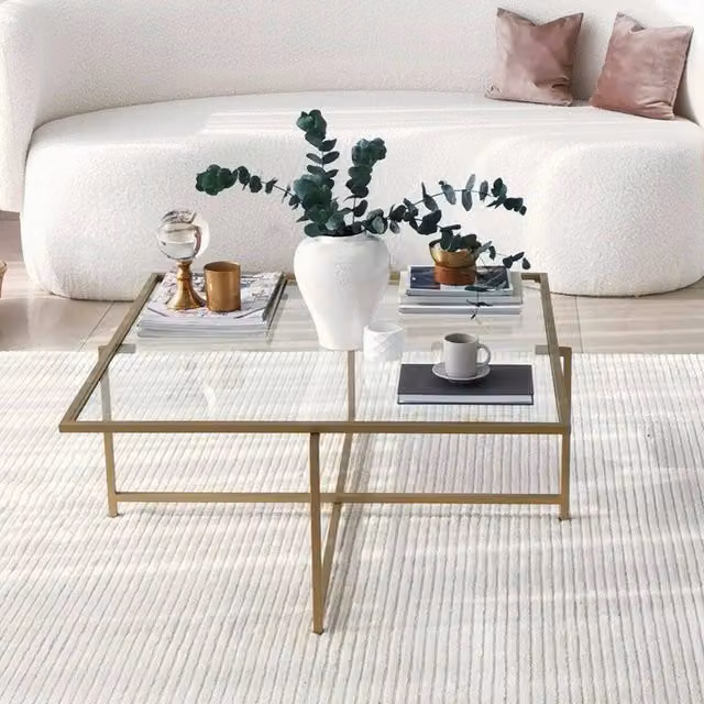 Tavolino da salotto moderno Mascate DMORA con cassetti, vetro trasparente e struttura oro, L 85 x P 85 x H 35 cm
