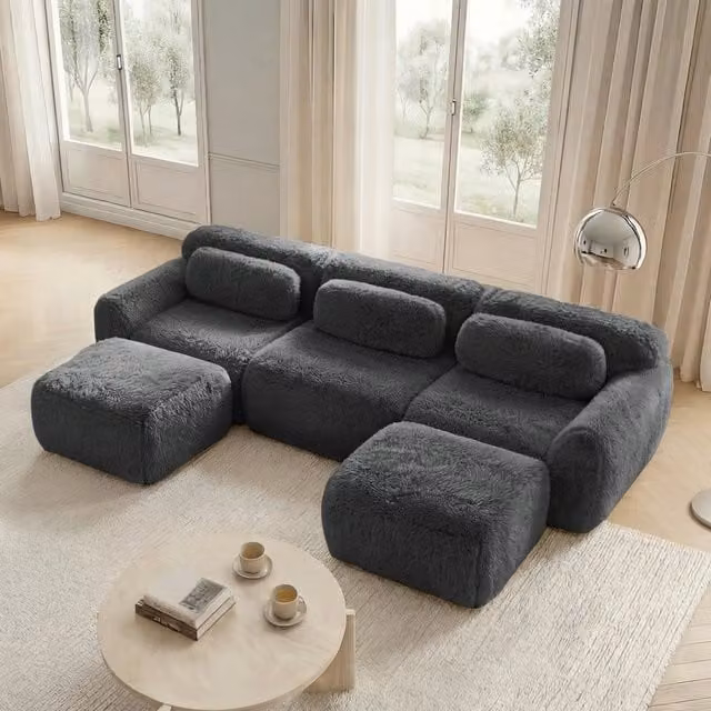Divano modulare a U configurabile in peluche con seduta ampia pouf collegabile base antiscivolo grigio per soggiorno
