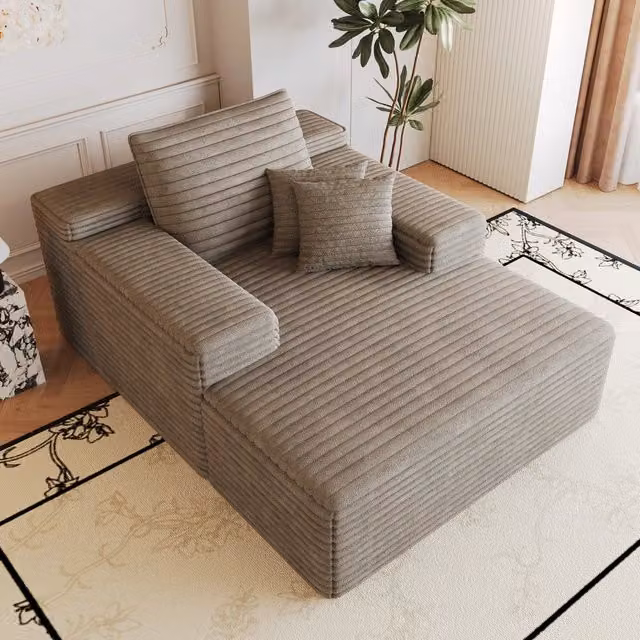Divano con chaise longue in velluto a coste color cammello; senza montaggio