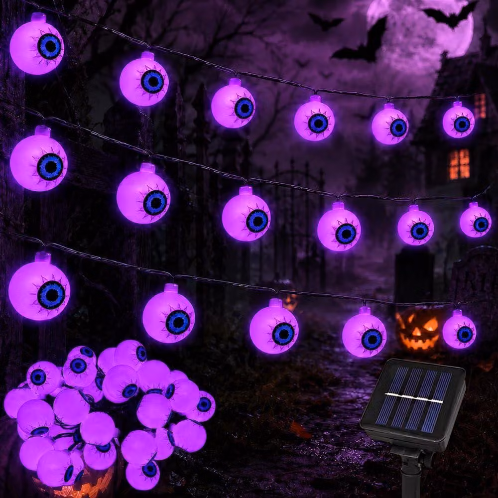 Catena luminosa a energia solare a tema Halloween, con 30 LED a forma di occhi spaventosi, lunghezza 6,3 metri, colore viola, grado di protezione IP65