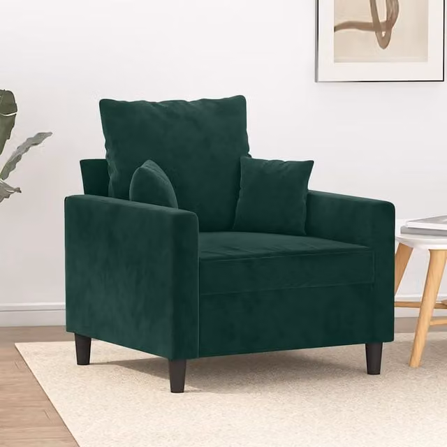Poltrona moderna in velluto verde con struttura in metallo e braccioli