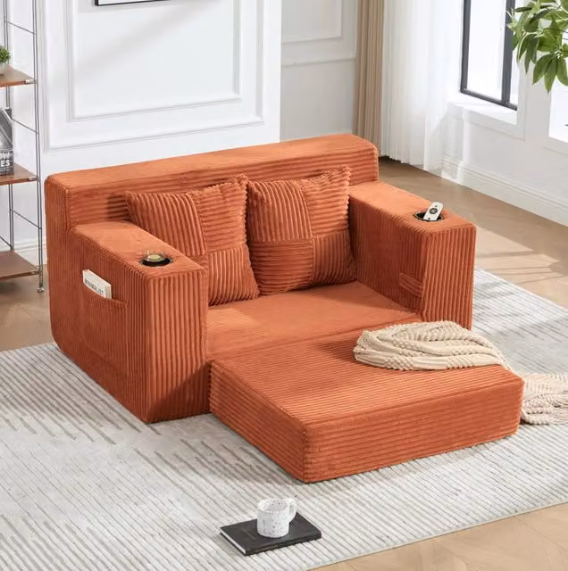 Divano pouf in velluto a coste arancione con tasche laterali e 2 cuscini