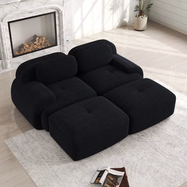 Divano angolare modulare in tessuto a coste senza montaggio con braccioli ergonomici e base antiscivolo nero