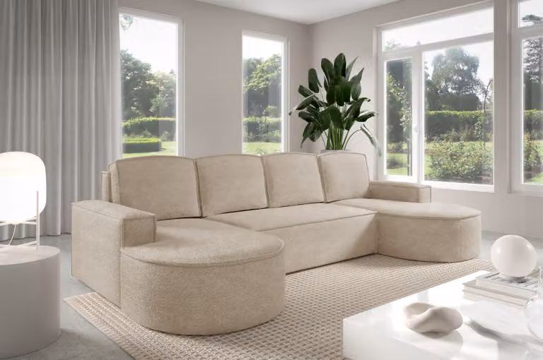 Divano angolare GUTTO Molly a forma di L, con linee arrotondate e in un delicato color crema beige: un design moderno e di tendenza! Novità 2025 (con funzione letto)