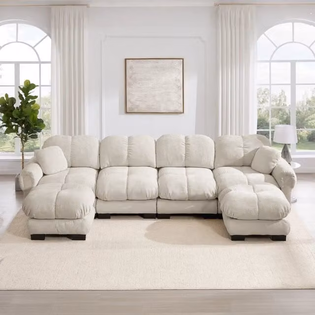 Divano panoramico modulare FOLYNA in velluto verde con pouf coordinato e cuscini, L: 330 cm, P: 149 cm, H: 90 cm