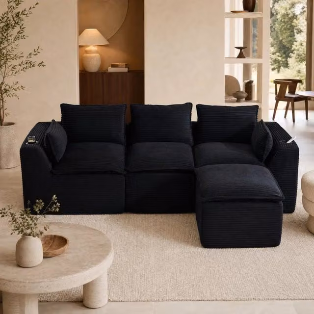 Divano modulare in velluto a coste nero con pouf e cuscini HAVRYA