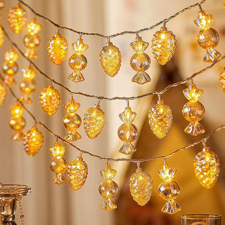 Catena luminosa con pigne, lunghezza 3 metri, 20 LED, luce bianco caldo, alimentazione a batteria