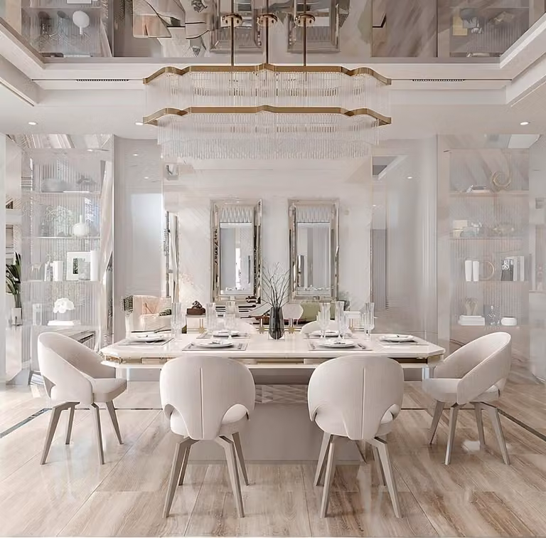 Set da pranzo con tavolo, sedie e decorazioni dorate