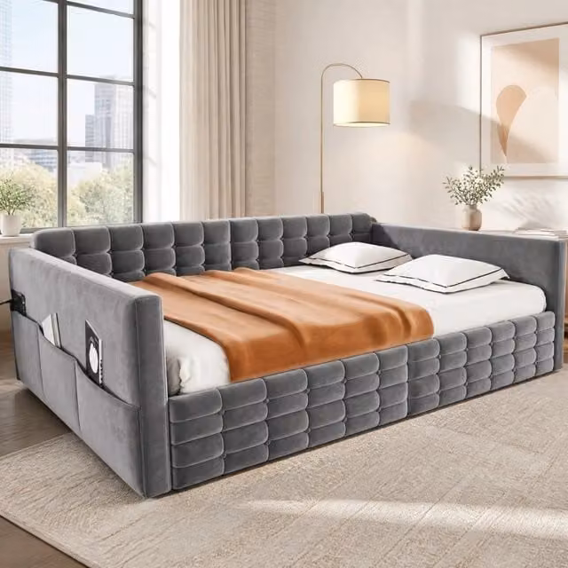 Letto imbottito 140x190 con 2 cassetti; tasche laterali; velluto grigio