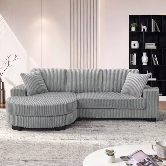 Divano angolare a L MIVRAY in velluto a coste grigio con pouf ovale reversibile e 2 cuscini L/P/H: 256,5 x 89 x 133,5 cm – 1