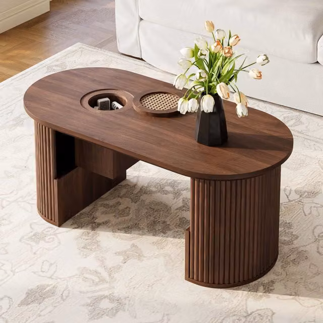 Tavolino basso ovale OKWISH in MDF color noce con vani aperti e ripiano intrecciato per soggiorno L/P/H: 105 x 50 x 46,5 cm