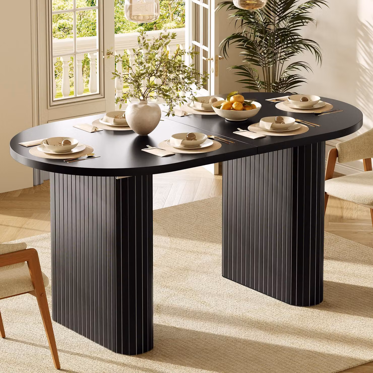 Tavolo allungabile "okwish" per la cucina o il soggiorno, con struttura verticale e piano ovale, disponibile in colore nero