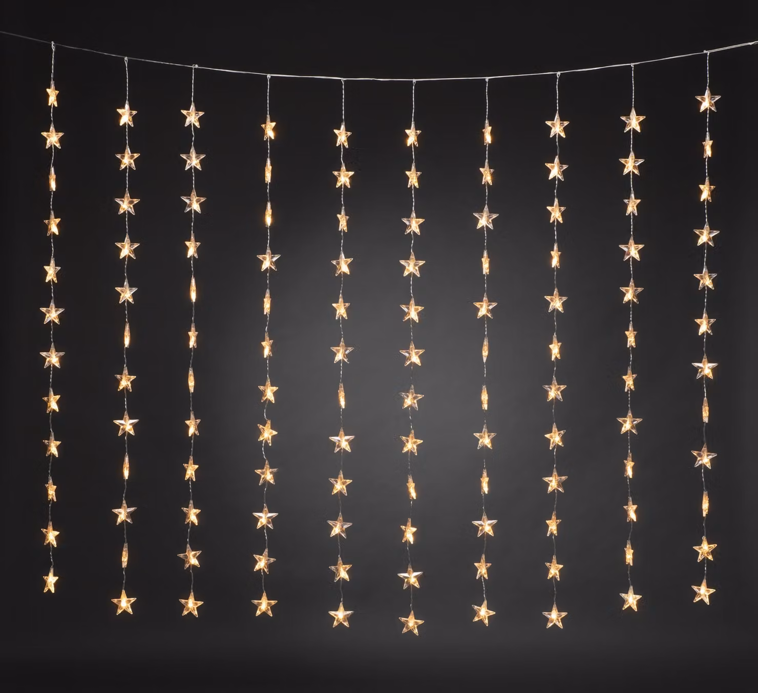 Barriera luminosa a LED Konstsmide, 120 stelle, 120 diodi color ambra, trasformatore interno 30V, 3,6W, cavo trasparente - 3703-803