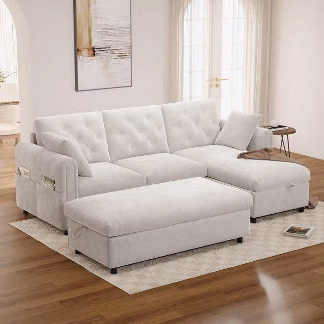 Divano angolare MIVRAY in velluto beige con chaise longue reversibile e pouf contenitore, schienale trapuntato, L/P/H: 219 x 86 x 131 cm