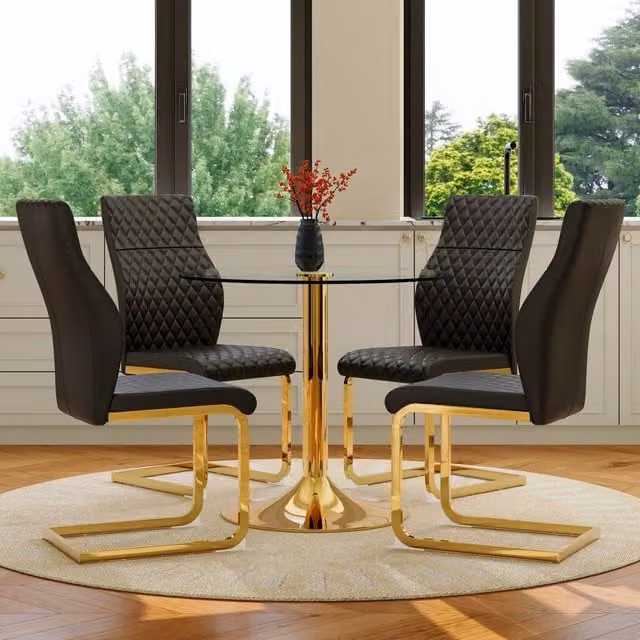 Set tavolo e sedie: tavolo rotondo in vetro temperato Ø85 cm con base metallo oro, 4 sedie da pranzo moderne nere e oro