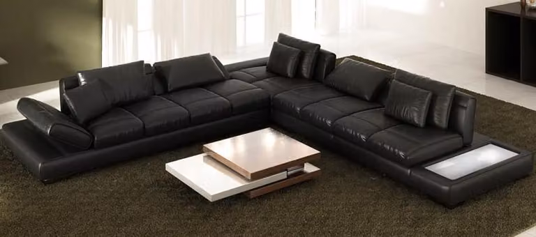 Divano angolare moderno, rivestito in pelle, design elegante, set di divani, soluzione d'arredo per il soggiorno, modello PHM12