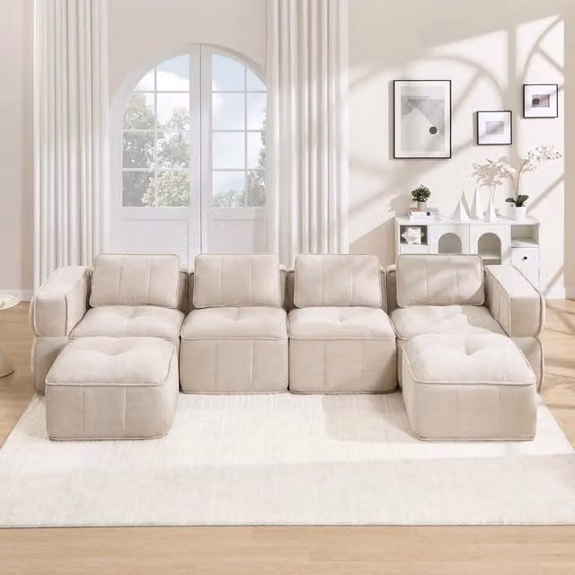 Divano modulare a U Minimal da 4 posti in tessuto beige con 2 poggiapiedi coordinati
